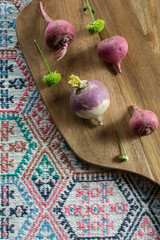 still life with cutting board, tribal cloth, mums, beets, and rutabaga