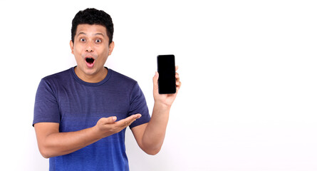 Shock and surprise face of Asian man presenting smart phone on white background in studio With copy...