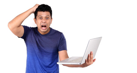 Portrait of sad Asian man with laptop computer and notebooks isolated  on white background in studio With copy space.
