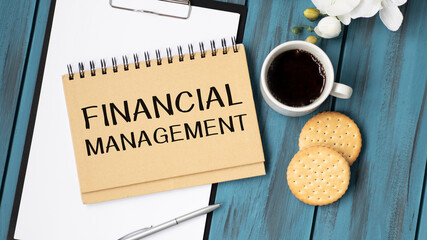 Financial Management text on notebook, business conceptual