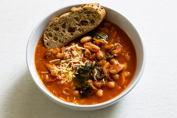 Homemade Ribollita, tuscan bean soup with light rye ciabatta