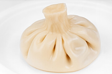Traditional Georgian dumplings khinkali stuffed with ground beef meat and spices
