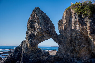 Unusual rock formation near Wagonga Head in Narooma called Australia rock. Destination South Coast, New South Wales.