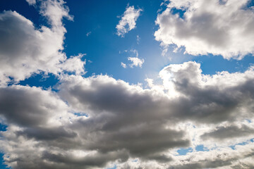 Blue sky background with a tiny clouds