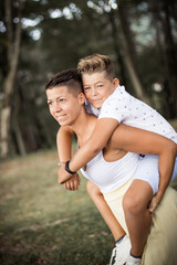 Obraz premium Mother and son in the park