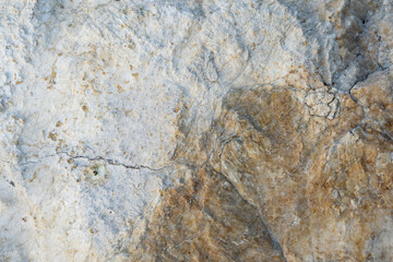 Natural pattern of white and yellow marble texture or background.