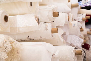 white cotton fabrics in rolls