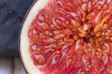 Raw halved fig fruit macro close up.