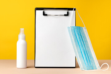 Clipboard with copy space and medical face mask