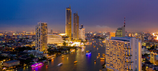 Bangkok City at night time, Hotel and resident area in the capital of Thailand, Bangkok Cityscape, Business district with high building at dusk