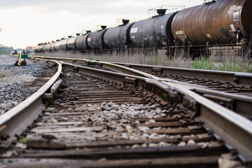Fototapeta na wymiar Train tracks with tankers