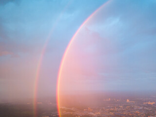 Aerial drone view. Double rainbow on a rainy evening over Kiev city.