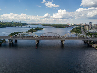 Aerial drone view. Darnitsky railway and automobile bridge in Kiev.