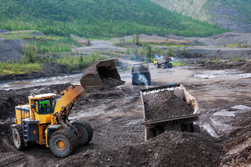 The mountainous dump truck is widely used for transporting and unloading rocks. Mining.