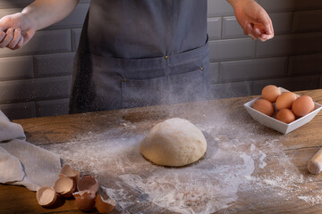Chef preparing a portion of fresh dough. Cooking dumplings – step by step guide.