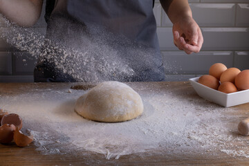 Chef preparing a portion of fresh dough. Cooking dumplings – step by step guide.