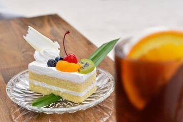 Close-up view, Fruit cake on glass plate.