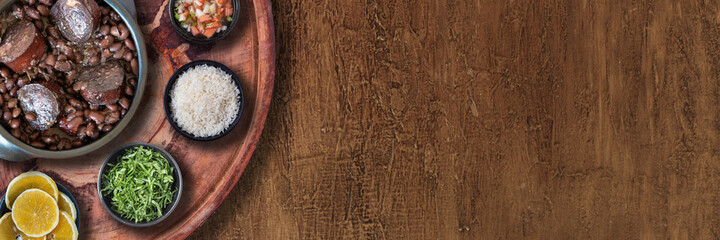 Feijoada. Traditional Brazilian food. Top view. Copy space.Outdoor format.