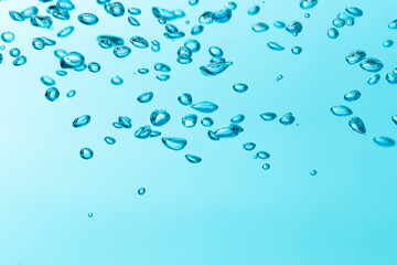 Air bubble and water splash,Water splash isolated on blue background.