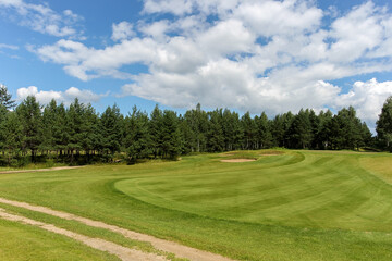 The Summer landscape golf course panorama and background. 