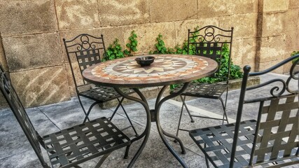 table and chairs on the street