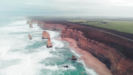 Amazing aerial view of Twelve Apostles cliffs on a coudy afternoon
