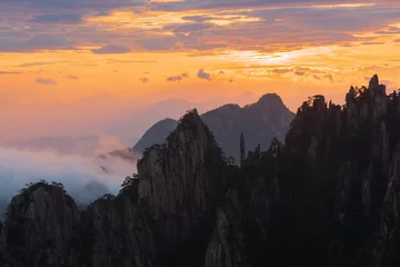 Papier Peint photo Monts Huang Beautiful Huangshan mountains landscape at sunrise in China.