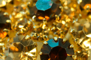 macro photography of a piece of jewelry with lots of precious stones