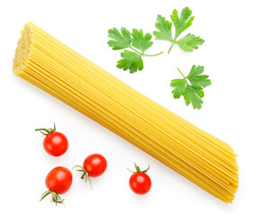 Raw pasta with tomatoes and herbs on a white background, isolated. Top view