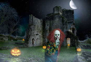 creepy clown in a spooky environment with pumpkins and an old wall
