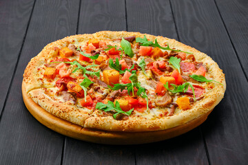 Pizza with pumpkin, sausage, bacon and honey mushrooms
