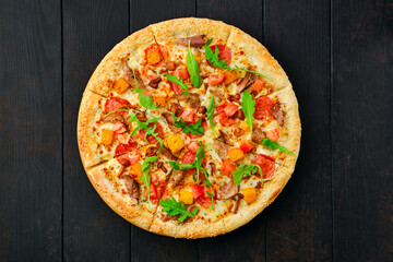 Pizza with pumpkin, sausage, bacon and honey mushrooms