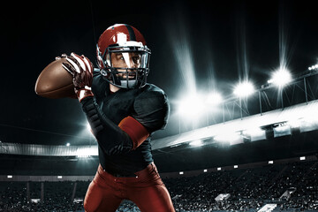 American football player, athlete sportsman in red helmet on stadium background. Sport and...