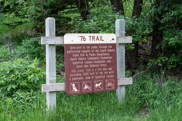Spearfish, South Dakota - SIgn for the 76 Trail, a hiking trail leading to a panoramic view of the Spearfish Canyon
