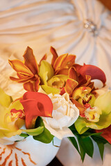 Wedding rings on bridal bouquet