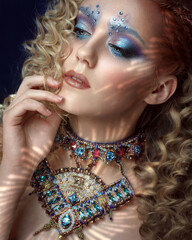 Portrait of a girl with creative makeup.