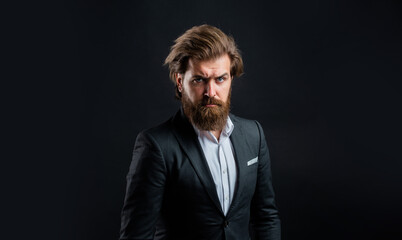 bride groom. mens office wardrobe. fashionable man dressed in suit. formal fashion model. handsome man on gray background. serious bearded businessman. stylish mature man looking modern
