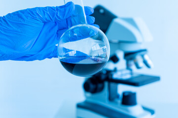 test tube containing blood sample infection from flu disease tested in medical science laboratory