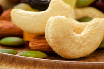 The plate contains nutritious mixed nuts