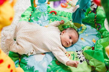 baby on playmat