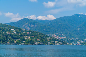 Fototapeta premium Lake Como in Lombardy, Italy with towns in the mountains