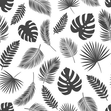 Seamless pattern silhouettes tropical leaves
