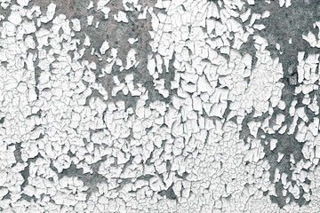 Old cracked paint texture. White paint on black surface.
