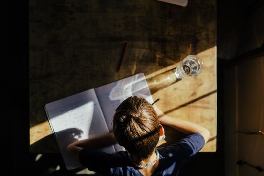 young boy doing homework