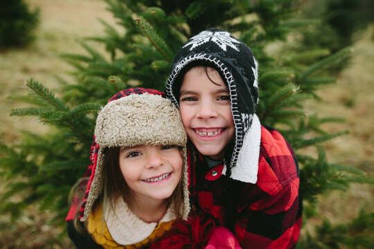 happy kids in winter clothing outdoors