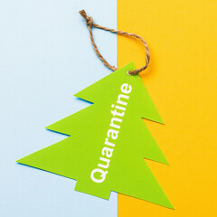 Tag with text on a colored background. Christmas quarantine