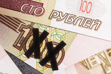 2 zeros are crossed out on one hundred ruble bill. Concept on the topic of devaluation of the Russian currency