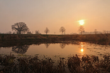 Naklejka premium sunrise over the river