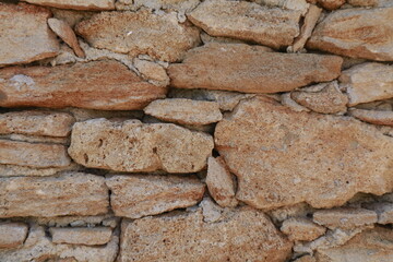 texture di muro di sassi marroni