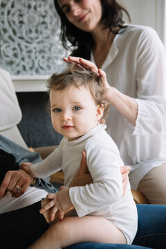 Professional Osteopath Working With Crawling Toddler Child